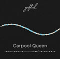 Carpool queen spelled in Morse code in glass and metal beads, shown on black