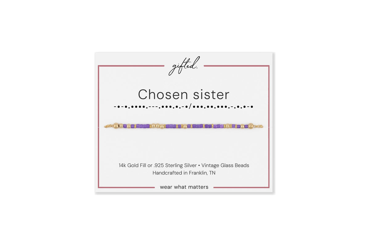 Chosen sister spelled in Morse code in glass and metal beads on a gifted. card.