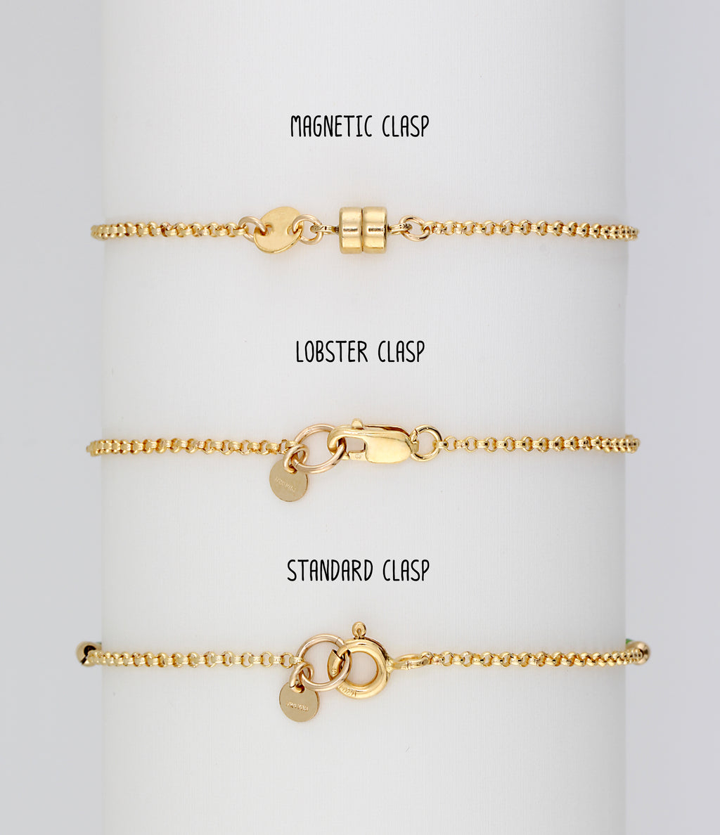 The three clasp options shown in gold: magnetic, lobster and standard spring ring.