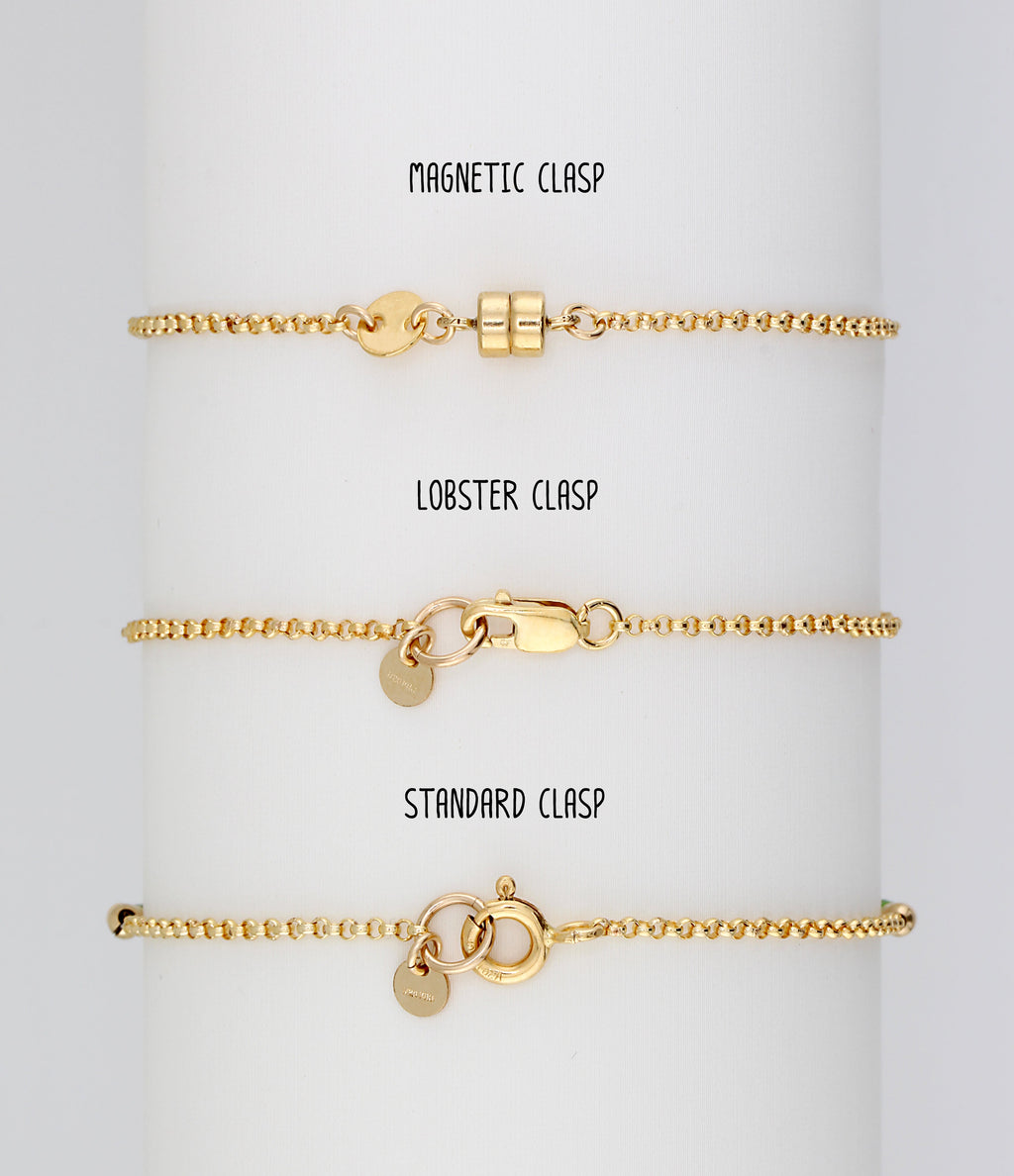 The three clasp options shown in gold: magnetic, lobster and standard spring ring.
