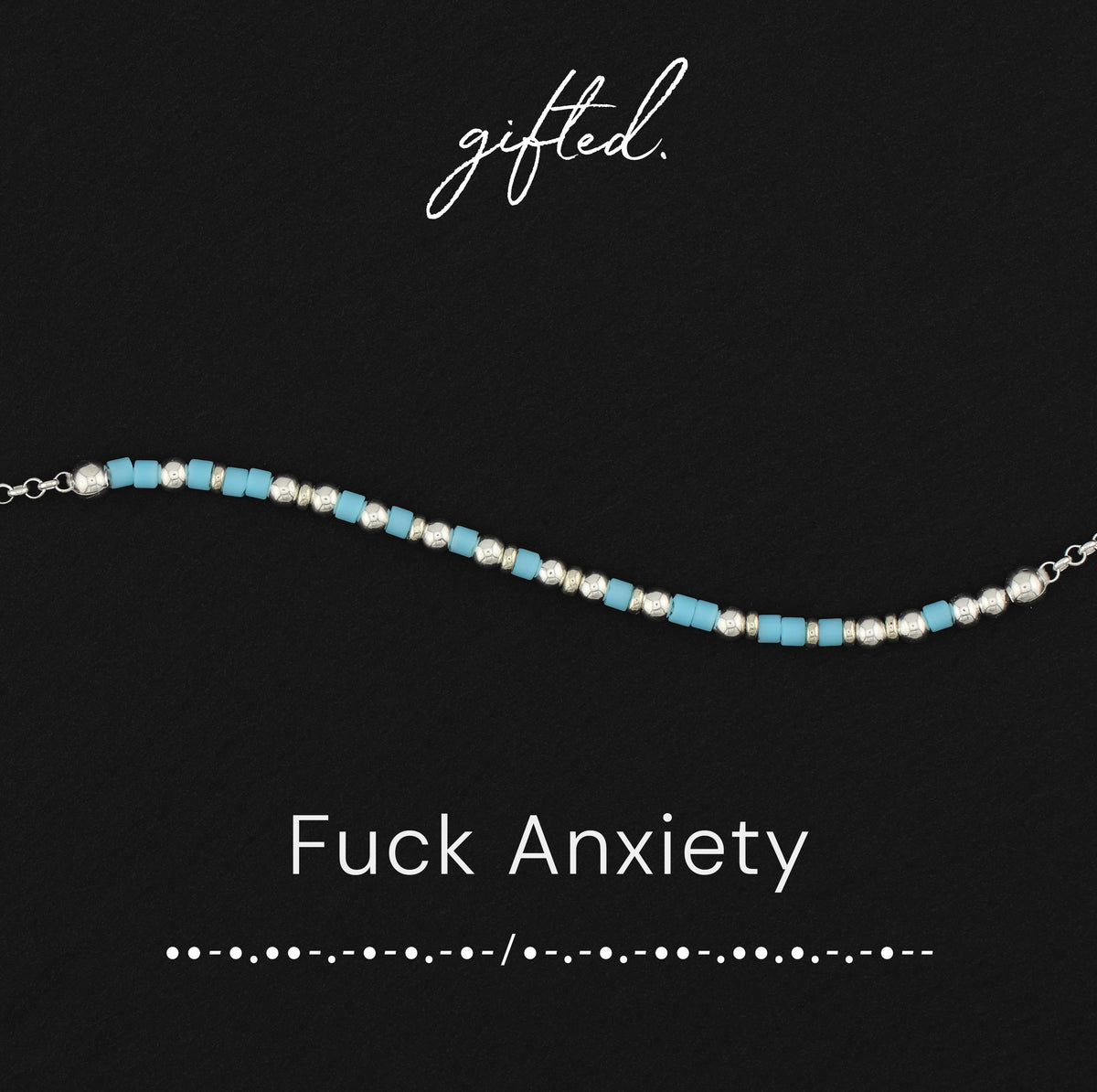 Fuck anxiety spelled in Morse code in glass and metal beads, shown on black