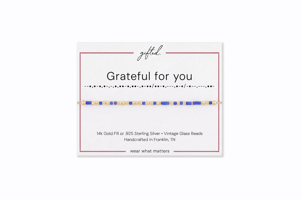 Grateful for you spelled in Morse code in glass and metal beads on a gifted. card.