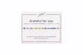 Grateful for you spelled in Morse code in glass and metal beads on a gifted. card.