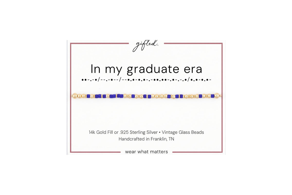 In my graduate era spelled in Morse code in glass and metal beads on a gifted. card.
