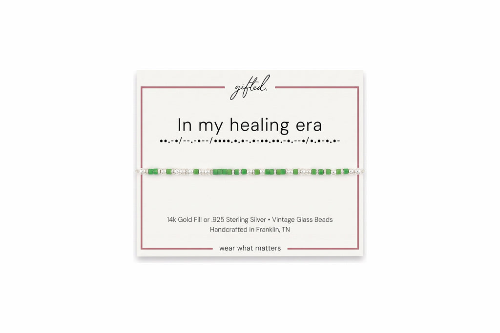In my healing era spelled in Morse code in glass and metal beads on a gifted. card.