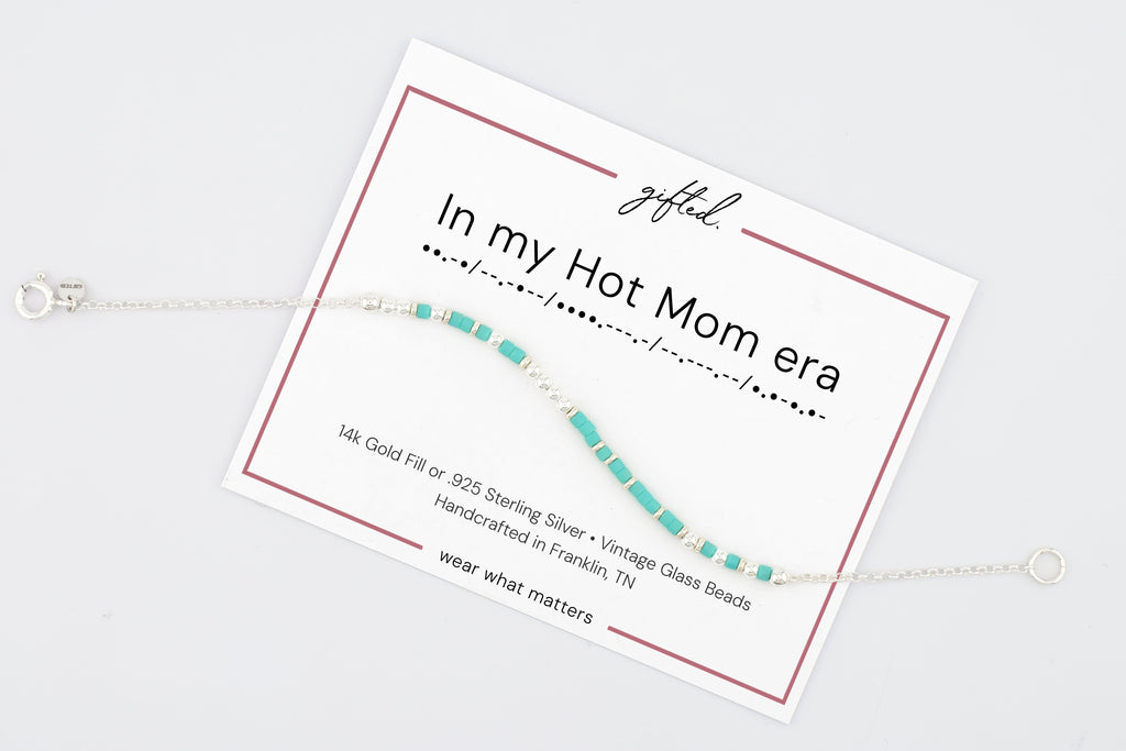 In my hot mom era on its printed gifted. card, with the Morse line and the materials named