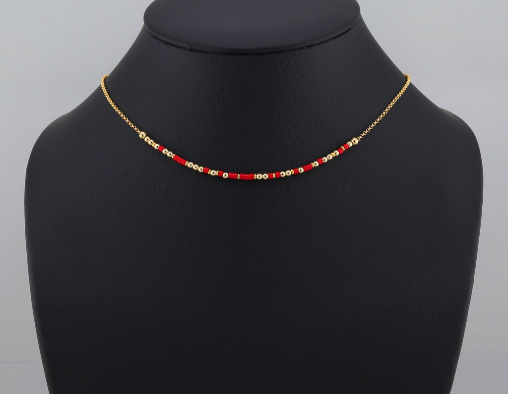 Morse code necklace on a 16 inch rolo chain, shown on a black bust