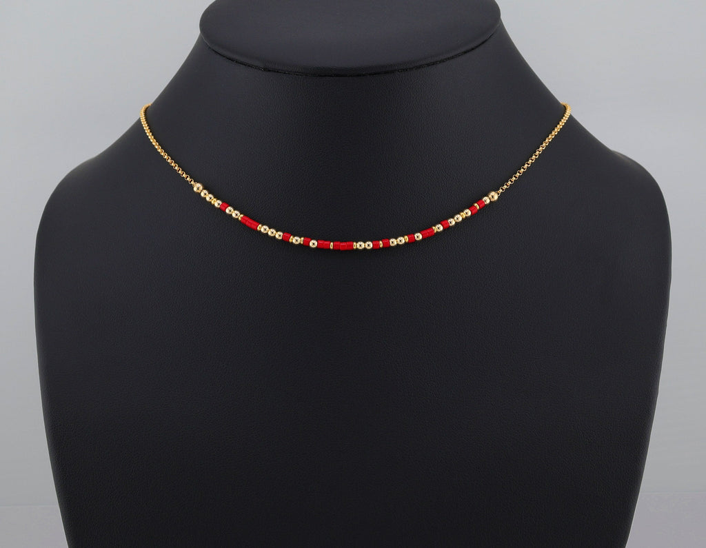 Morse code necklace on a 16 inch rolo chain, shown on a black bust