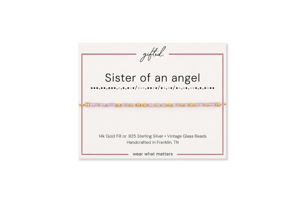Sister of an angel spelled in Morse code in glass and metal beads on a gifted. card.