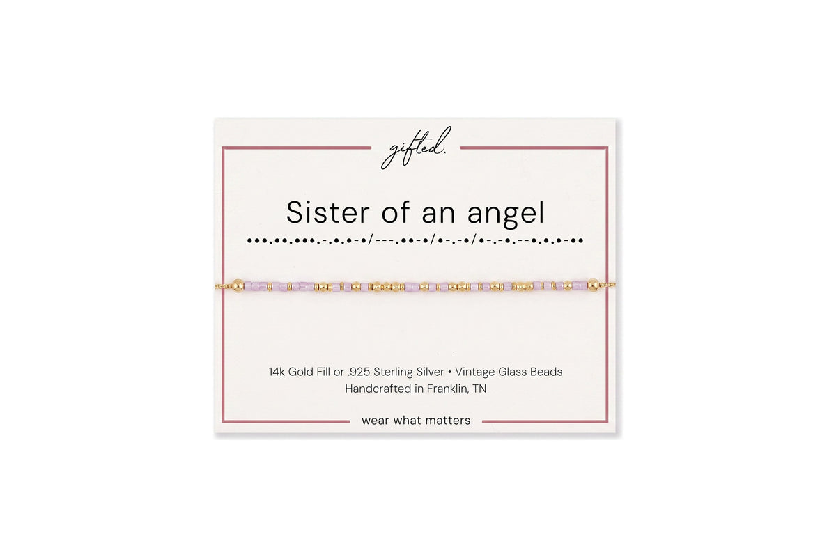 Sister of an angel spelled in Morse code in glass and metal beads on a gifted. card.