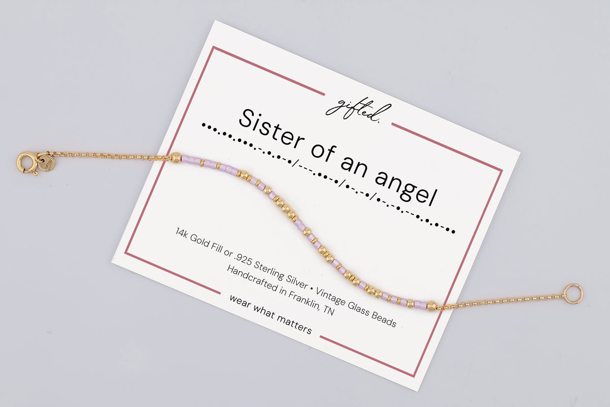 Sister of an angel on its printed gifted. card, with the Morse line and the materials named