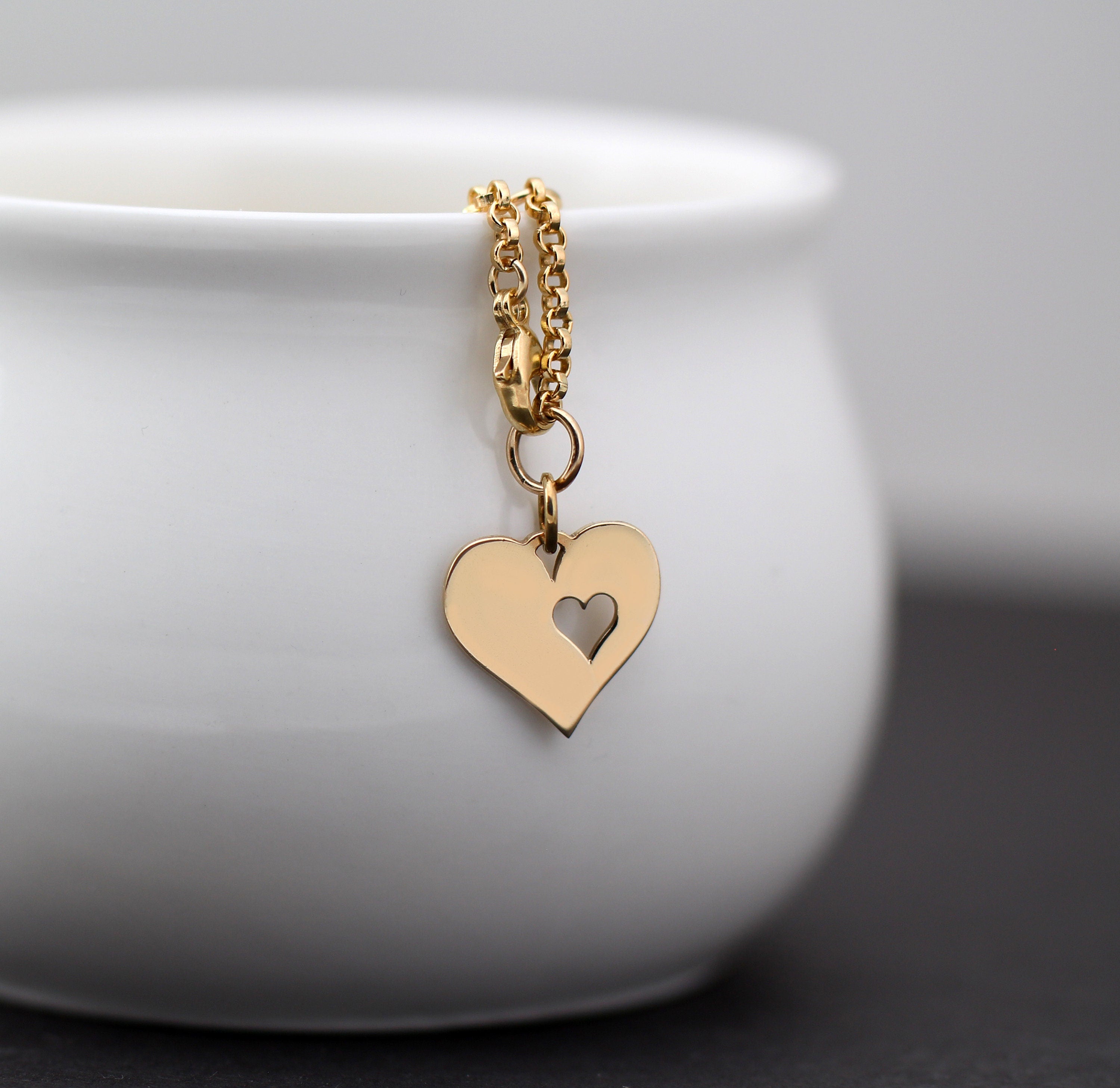 Heart Cutout Heart Bracelet: Silver or Gold Charm