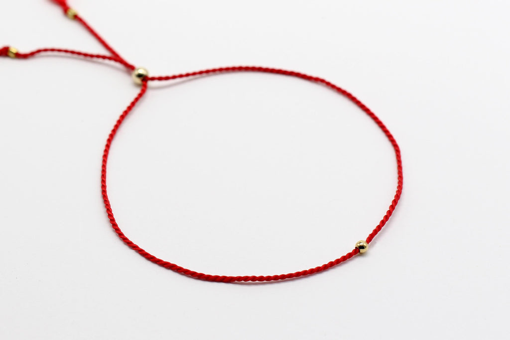 Red thread of fate on message card. 14k Gold Fill or Sterling Silver Beads.