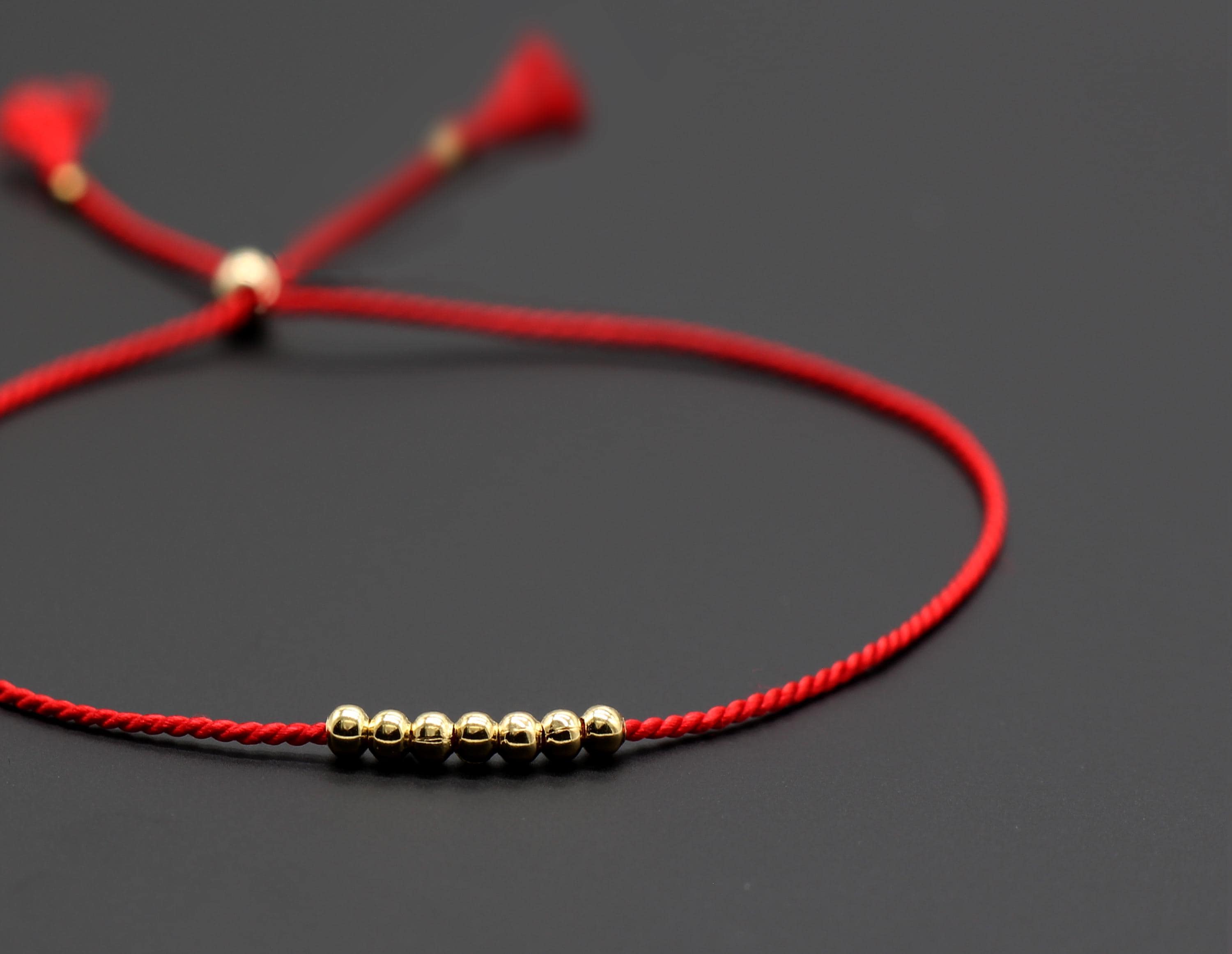 Red thread of fate on message card. 14k Gold Fill or Sterling Silver Beads.