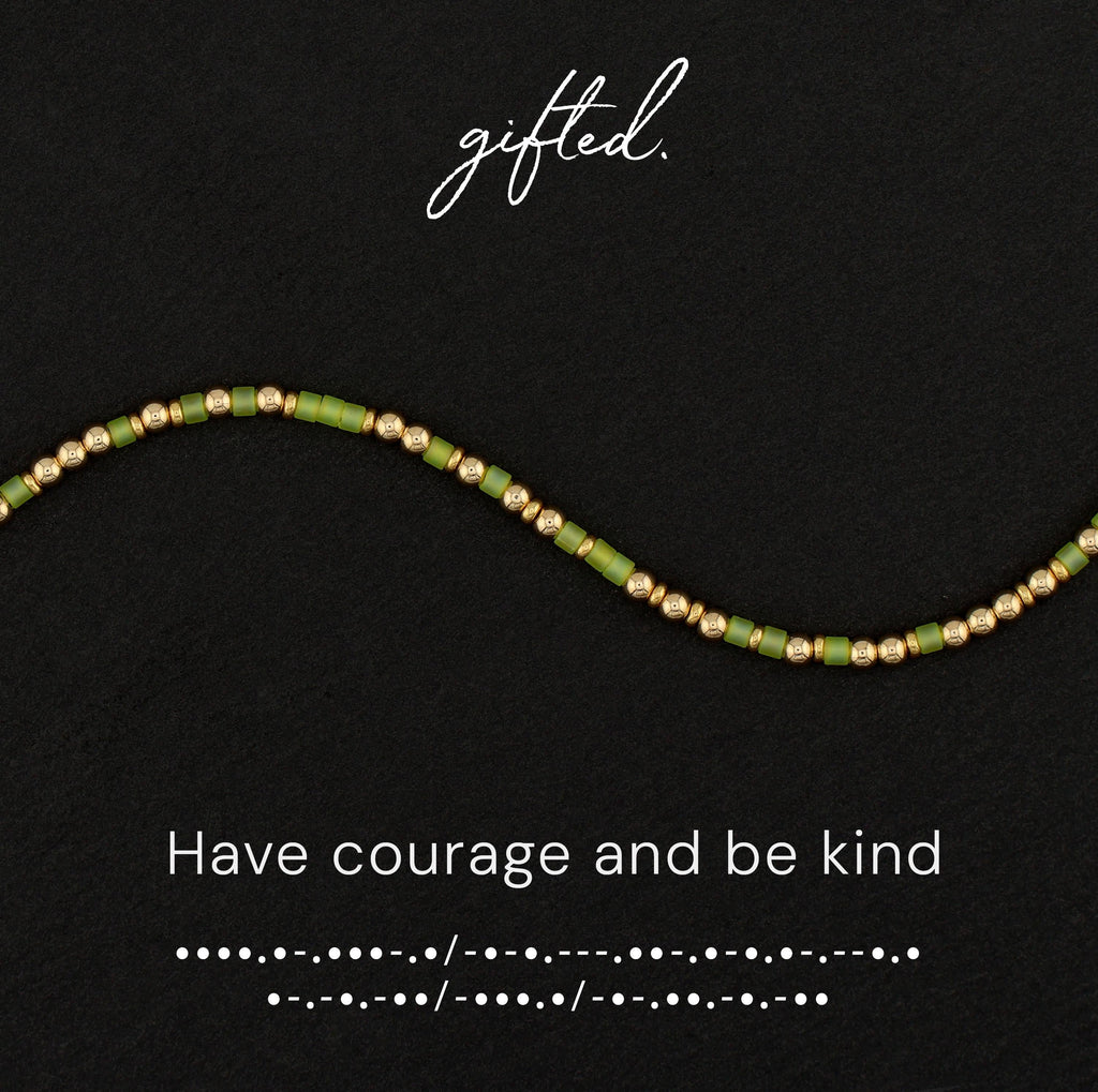 Have courage and be kind spelled in Morse code in beads on a gifted. card