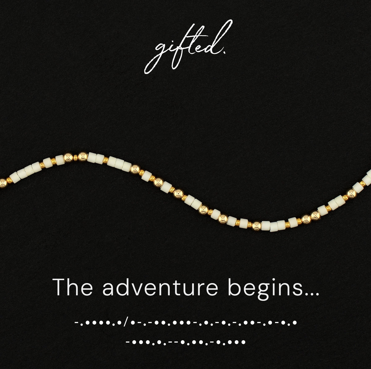 The Adventure Begins spelled in Morse code in glass and metal beads, shown on black