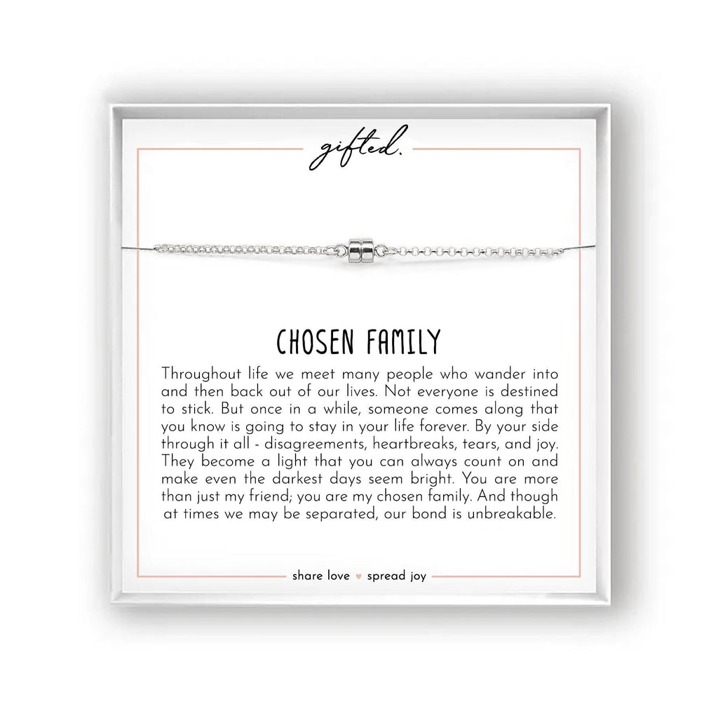 May include: A silver-toned bracelet with a central cylindrical bead is displayed on a white card. The card features the word "gifted" in cursive and the phrase "CHOSEN FAMILY" in bold text. The card also includes a message about chosen family and the phrase "share love spread joy."