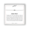 May include: A silver-toned bracelet with a central cylindrical bead is displayed on a white card. The card features the word "gifted" in cursive and the phrase "CHOSEN FAMILY" in bold text. The card also includes a message about chosen family and the phrase "share love spread joy."