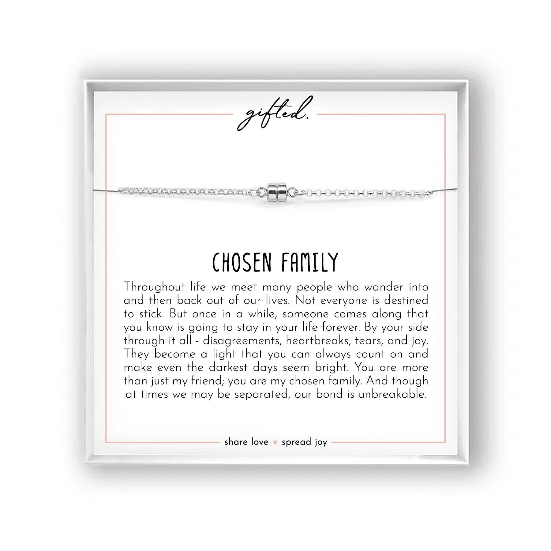 May include: A silver-toned bracelet with a central cylindrical bead is displayed on a white card. The card features the word "gifted" in cursive and the phrase "CHOSEN FAMILY" in bold text. The card also includes a message about chosen family and the phrase "share love spread joy."