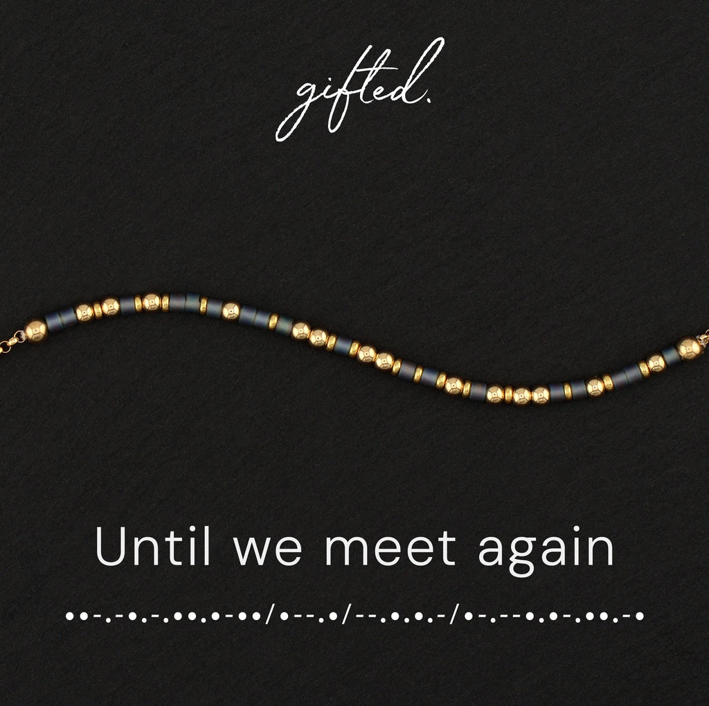 Until We Meet Again spelled in Morse code in glass and metal beads, shown on black