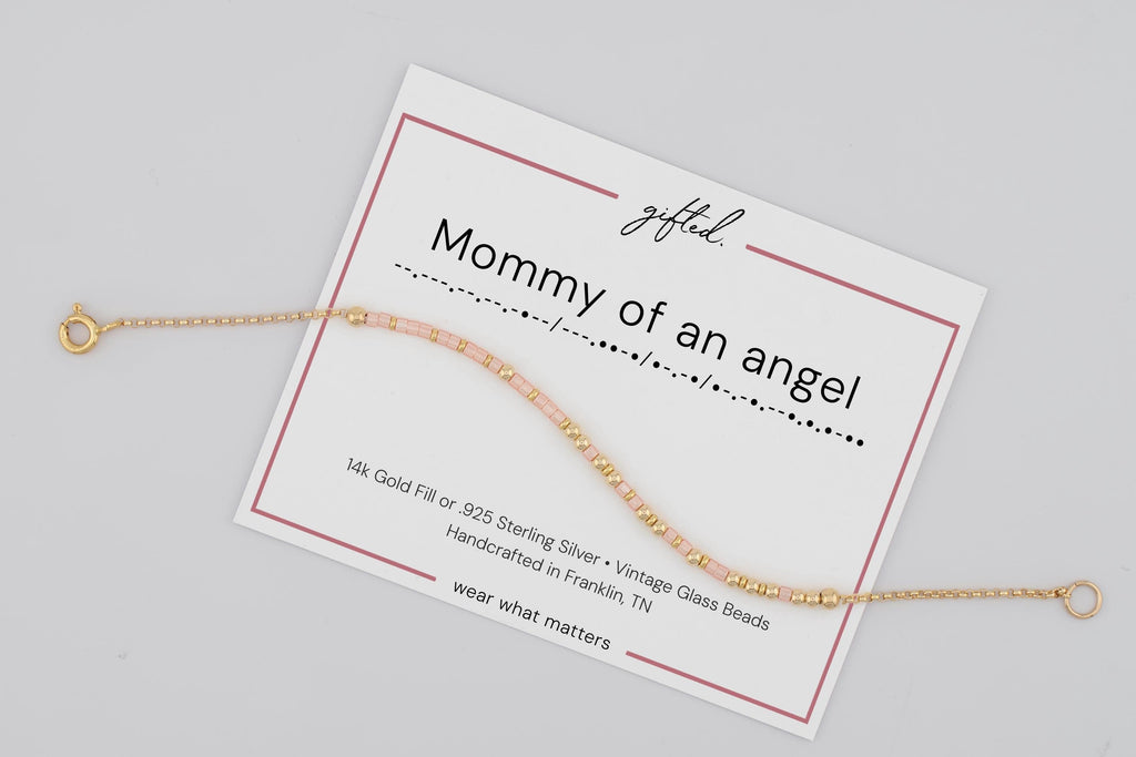 Mommy of an Angel spelled in Morse code on a beaded bracelet, shown on its printed gift card