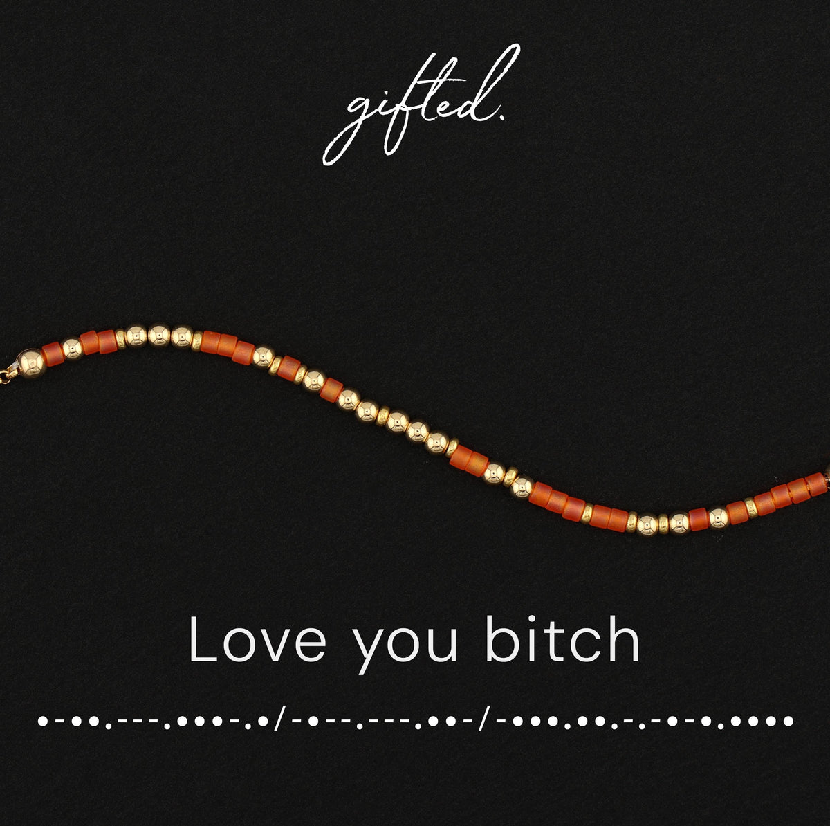 Love you bitch spelled in Morse code in beads on a gifted. card