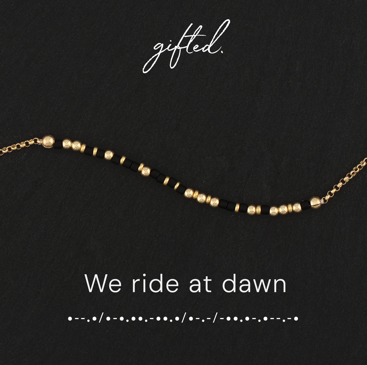 We ride at dawn spelled in Morse code in beads on a gifted. card