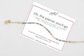 Oh the Places You'll Go spelled in Morse code on a beaded bracelet, shown on its printed gift card