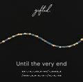 Until the very end spelled in Morse code in beads on a gifted. card