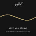 With You Always spelled in Morse code in glass and metal beads, shown on black