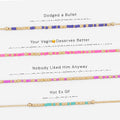 Your own phrase spelled in Morse code on a beaded bracelet, shown on white