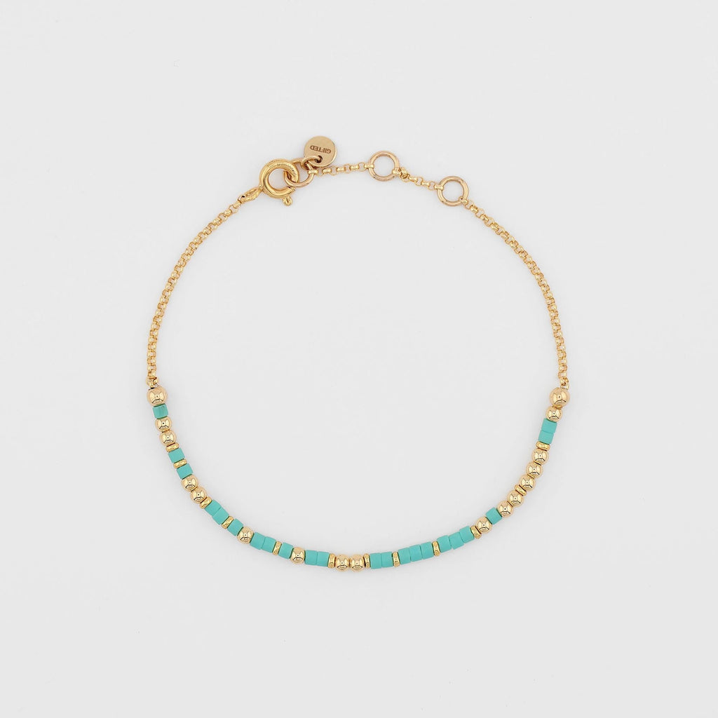 Your own phrase spelled in Morse code on a beaded bracelet, shown on white