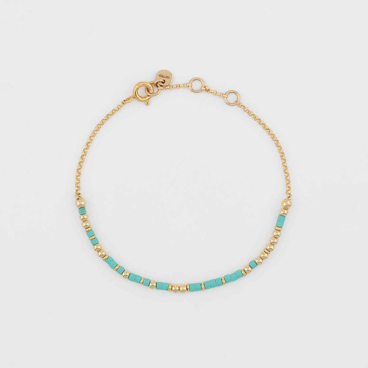 Your own phrase spelled in Morse code on a beaded bracelet, shown on white